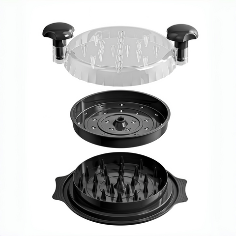 close-up of rotating teeth inside chicken shredder machine