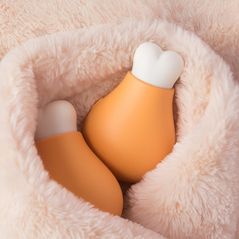cute drumstick hand warmer carried in hand during cold outdoor moment from Gallery of Use