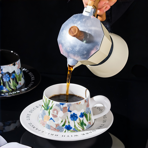 ceramic iris cup & saucer set in cozy morning coffee setup
