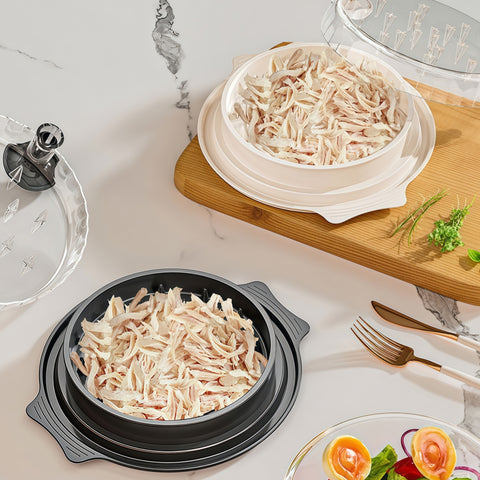 chicken shredder machine shredding cooked chicken during meal prep