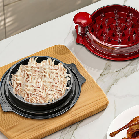 chicken shredder machine shredding cooked chicken during meal prep