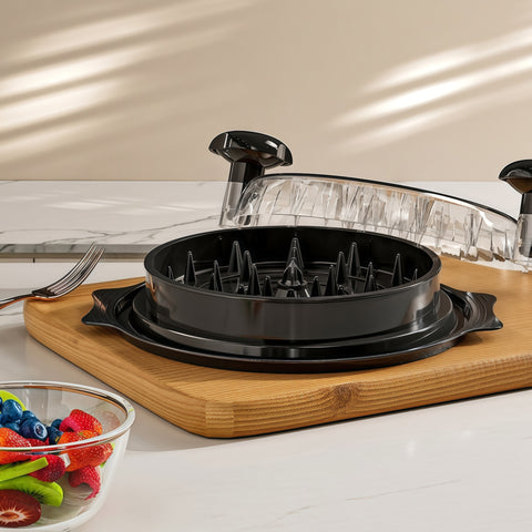close-up of rotating teeth inside chicken shredder machine