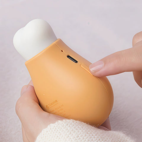 close-up of drumstick shape and smooth surface on hand warmer
