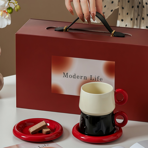 red-ball cup & saucer gift set on warm tabletop for gifting
