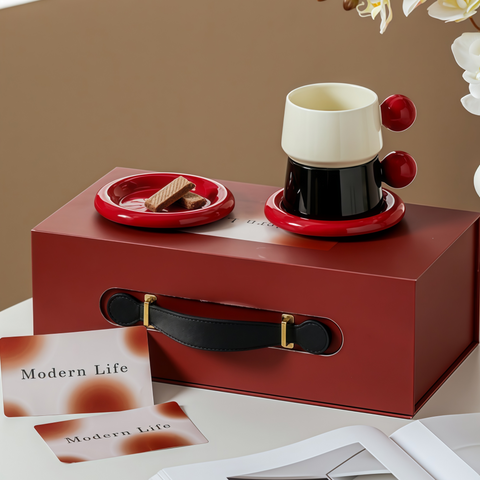 red-ball cup & saucer gift set on warm tabletop for gifting