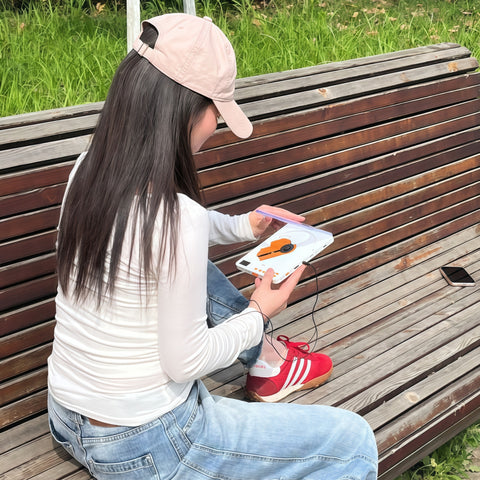 portable bluetooth CD player carried during relaxed outdoor moment from Gallery of Use