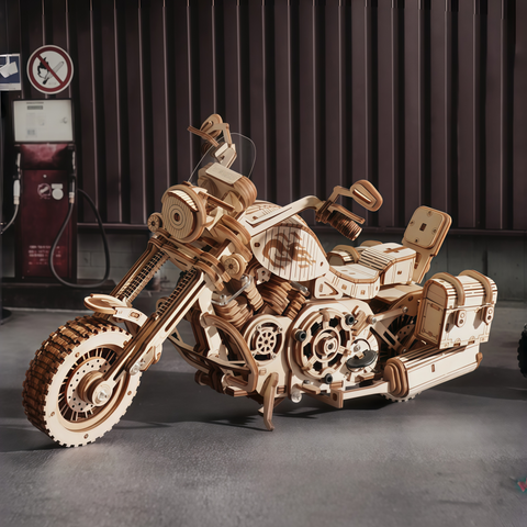 assembled wooden motorcycle puzzle placed on desk for creative fun